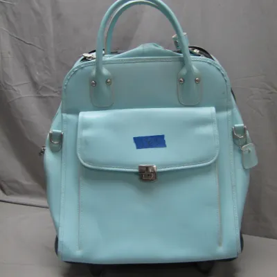 Sale Photo Thumbnail #242: Light blue faux leather rolling tote bag with front flap pocket, top handles, and silver-tone hardware.