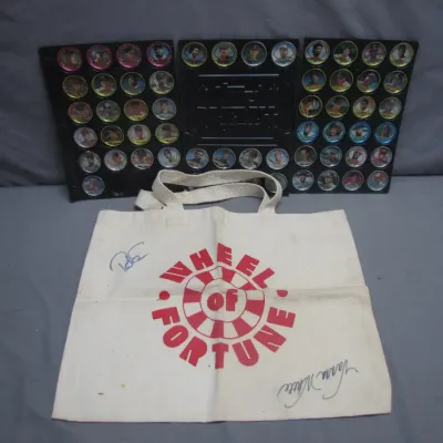Sale Photo Thumbnail #168: Canvas Wheel of Fortune tote bag featuring autographs, paired with plastic display sheets filled with collectible baseball coin-style medallions.