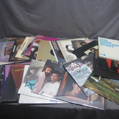 Sale Photo Thumbnail #269: Large collection of vintage country vinyl record albums featuring artists such as Hank Williams, Merle Haggard, Oak Ridge Boys, and Waylon Jennings.