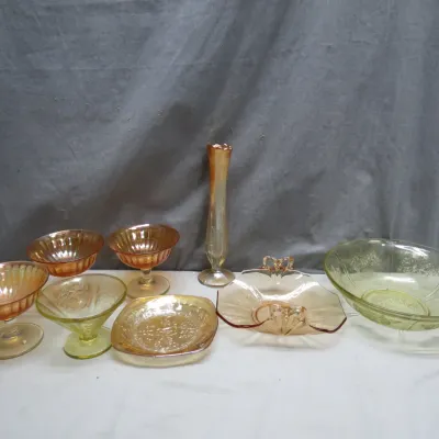 Sale Photo Thumbnail #17: Collection of vintage carnival glass and depression glass pieces, including a marigold bud vase, dessert cups, and decorative bowls.