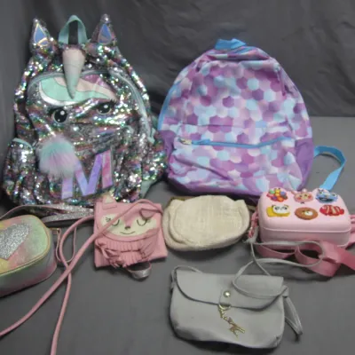 Sale Photo Thumbnail #165: Collection of girls' backpacks and small purses, including a sequined unicorn bag, scale-patterned backpack, and novelty crossbodies.