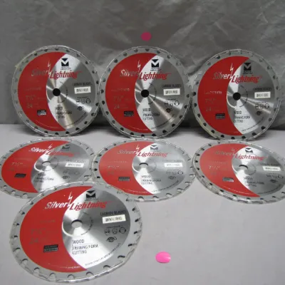 Sale Photo Thumbnail #216: Set of seven Mercer Abrasives Silver Lightning 7 1/4-inch 24-tooth carbide circular saw blades, new in original plastic packaging.