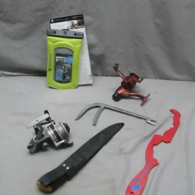 Sale Photo Thumbnail #300: Assortment of outdoor and fishing gear including two spinning reels, a sheath knife, a bright yellow waterproof pouch in original packaging, and specialized hand tools.