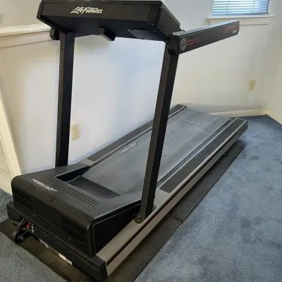 Sale Photo Thumbnail #42: Life Fitness commercial motorized treadmill with front console and side handrails