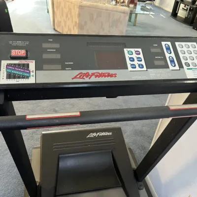 Sale Photo Thumbnail #41: Life Fitness commercial motorized treadmill with front console and side handrails