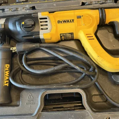 Sale Photo Thumbnail #9: DeWalt corded SDS rotary hammer drill with auxiliary side handle
