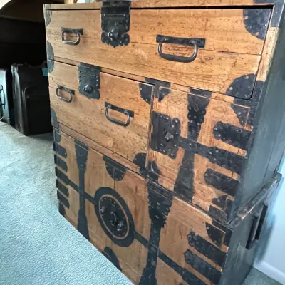 Sale Photo Thumbnail #72: Antique Japanese Meiji period two-section tansu chest, featuring natural wood grain with ornate hand-forged iron hardware and corner brackets.