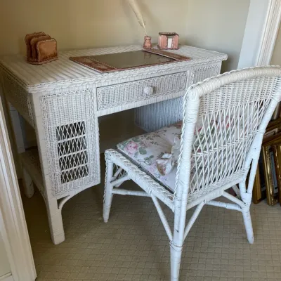 Sale Photo Thumbnail #57: White woven wicker desk and matching armchair with floral seat cushion, vintage style.