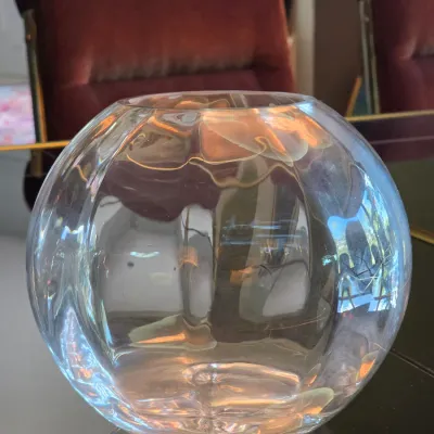 Sale Photo Thumbnail #40: Round clear glass rose bowl vase, featuring a subtle optic swirled pattern.