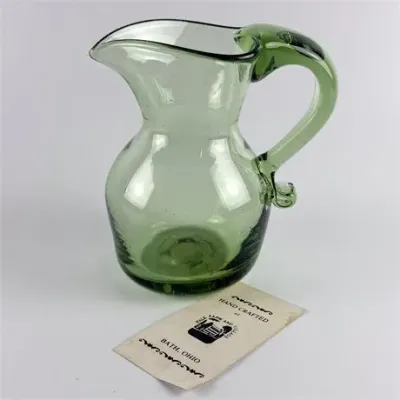 Lot 040   1 Bid(s)
Vintage Hale Farm and Village Bubble Glass Pitcher