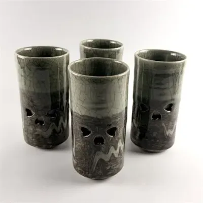 Lot 054  
Four Vintage Somayaki Japan Openwork Soma Ware Tumblers