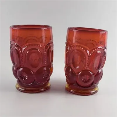 Lot 052 
Two Vintage L.E. Smith Amberina Glass Moon and Stars Tumblers
