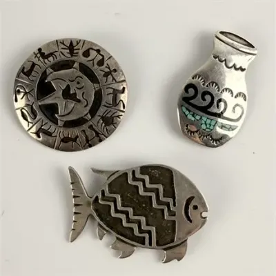 Lot 176  
Three Sterling Silver Mexican Brooches