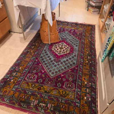 Sale Photo Thumbnail #65: Hand-knotted tribal runner rug featuring vibrant magenta, light blue, and gold tones with intricate geometric patterns.