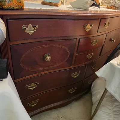 Sale Photo Thumbnail #133: Traditional mahogany bowfront dresser featuring marquetry inlay panels and brass bail handles.