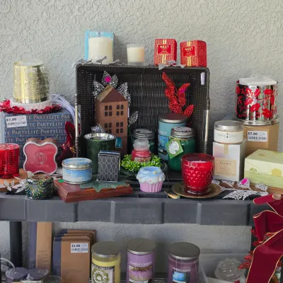 Sale Photo Thumbnail #328: Collection of assorted scented candles, wax melts, home fragrance accessories, and holiday decorations, including brands like Yankee Candle, Nest, and PartyLite.