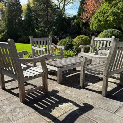Set Of Four Teak Armchairs With Teak Coffee Table