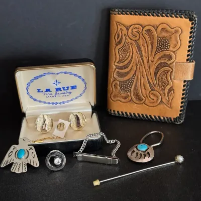 Collection of men's accessories, including a tool-patterned leather wallet, La Rue cufflinks and tie tack set in original box,...