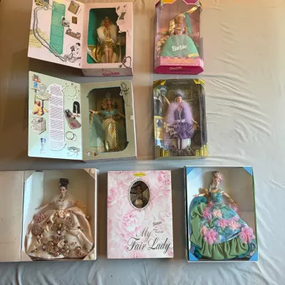 Sale Photo Thumbnail #103: Collection of seven special edition and collector Barbie dolls in their original packaging, including Egyptian Queen, Flapper, Dance 'Til Dawn, and My Fair Lady editions.