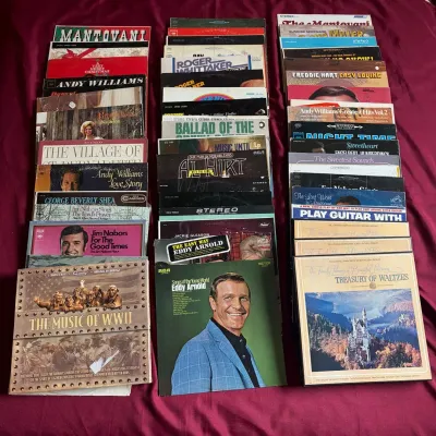 Large collection of vintage vinyl LP record albums and box sets, featuring artists such as Eddy Arnold, Andy Williams, and Mantovani.