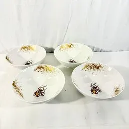 Sale Photo Thumbnail #38: Set of four white ceramic bowls featuring a brown scroll motif and gold splatter accents.