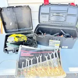 Sale Photo Thumbnail #12: DeWalt corded jigsaw in a hard case, paired with a plastic toolbox and a Popular Mechanics 11-piece SAE combination wrench set in a roll-up pouch.