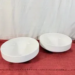 Sale Photo Thumbnail #183: Pair of modern white ceramic vessel sinks in smooth oval design.