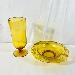 Sale Photo Thumbnail #90: Vintage amber depression glass goblet paired with a matching etched bowl featuring a floral motif.