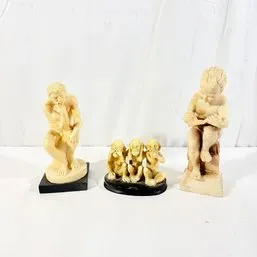 Sale Photo Thumbnail #98: Set of three off-white resin or composite figurines, including a reproduction of Rodin's The Thinker, Three Wise Monkeys, and a reading child statue.