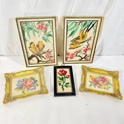 Sale Photo Thumbnail #168: Collection of vintage framed artwork and needlepoints, including a pair of Asian-style bird illustrations and ornate gold-framed floral needlework pieces.