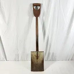 Sale Photo Thumbnail #48: Vintage square-point spade shovel with a wooden shaft and D-grip handle.