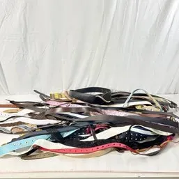 Sale Photo Thumbnail #133: Large collection of assorted vintage and contemporary belts in various colors, materials, and styles.