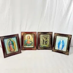 Sale Photo Thumbnail #154: Collection of four framed Catholic religious prints, including Our Lady of Guadalupe and the Immaculate Heart of Mary, set in matching ornate dark wood frames.