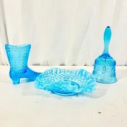 Sale Photo Thumbnail #55: Collection of three mid-century light blue hobnail glass decorative items, including a boot figurine, a ruffled rim dish, and a hand bell.
