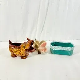 Sale Photo Thumbnail #206: Collection of mid-century ceramic planters, including a brown rhinocerous planter, a hippo planter, and a turquoise rectangular planter.