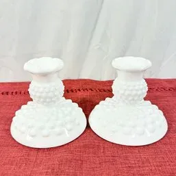 Sale Photo Thumbnail #184: Pair of vintage Fenton white milk glass hobnail candlestick holders in excellent condition.