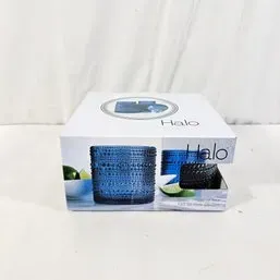 Sale Photo Thumbnail #187: Boxed set of modern Halo brand cobalt blue textured double old fashioned glasses in original packaging.