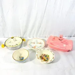 Sale Photo Thumbnail #145: Collection of mid-century vintage baby dishware, including hot water warming plates and ceramic feeding bowls with illustrated motifs.