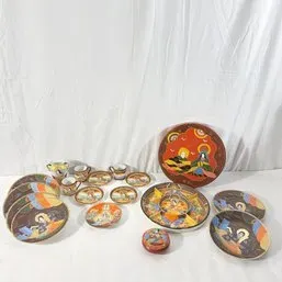 Sale Photo Thumbnail #129: Vintage Japanese Satsuma export porcelain tea set featuring hand-painted scenes with gilded accents.