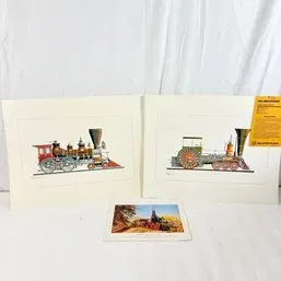 Sale Photo Thumbnail #239: Pair of matted vintage locomotive art prints featuring colorful steam engines, accompanied by a smaller landscape print.