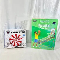 Sale Photo Thumbnail #2: Boxed Big Mouth Inc. Peppermint Twist inflatable snow tube alongside a Toymazing Basketball Play Set, both in original packaging.