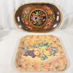 Sale Photo Thumbnail #190: Pair of vintage decorative serving trays, including an oval Zhostovo-style hand-painted floral tray with handles and a rectangular fruit-motif tray.