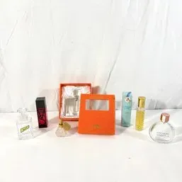 Sale Photo Thumbnail #160: Collection of vintage fragrance bottles and boxed perfume miniatures.