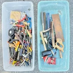 Sale Photo Thumbnail #45: Two plastic storage bins filled with an assortment of vintage hand tools, including pliers, screwdrivers, hammers, and a hand saw.