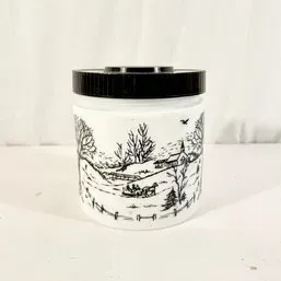 Sale Photo Thumbnail #111: Vintage white milk glass cookie jar or canister featuring a black transferware winter country scene and a black plastic screw-on lid.
