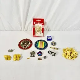 Sale Photo Thumbnail #152: Collection of military pins, medals, lapel buttons, and cufflinks, including US Army and Vietnam Veterans emblems.