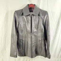 Sale Photo Thumbnail #219: Vintage dark gray leather jacket with zip-up front closure and point collar.