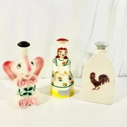 Sale Photo Thumbnail #119: Trio of vintage ceramic perfume and cologne bottles, featuring an elephant, a floral-dressed woman, and a rooster motif bottle, circa mid-20th century.