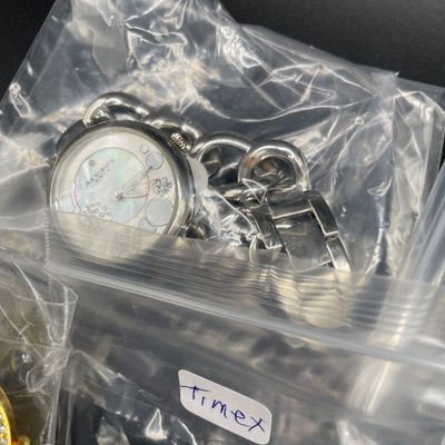 Sale Photo Thumbnail #147: Bag of watches