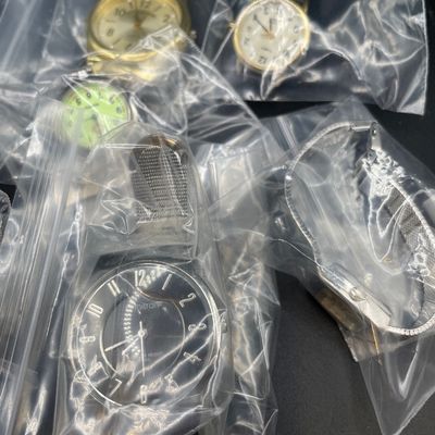 Sale Photo Thumbnail #146: Bag of watches